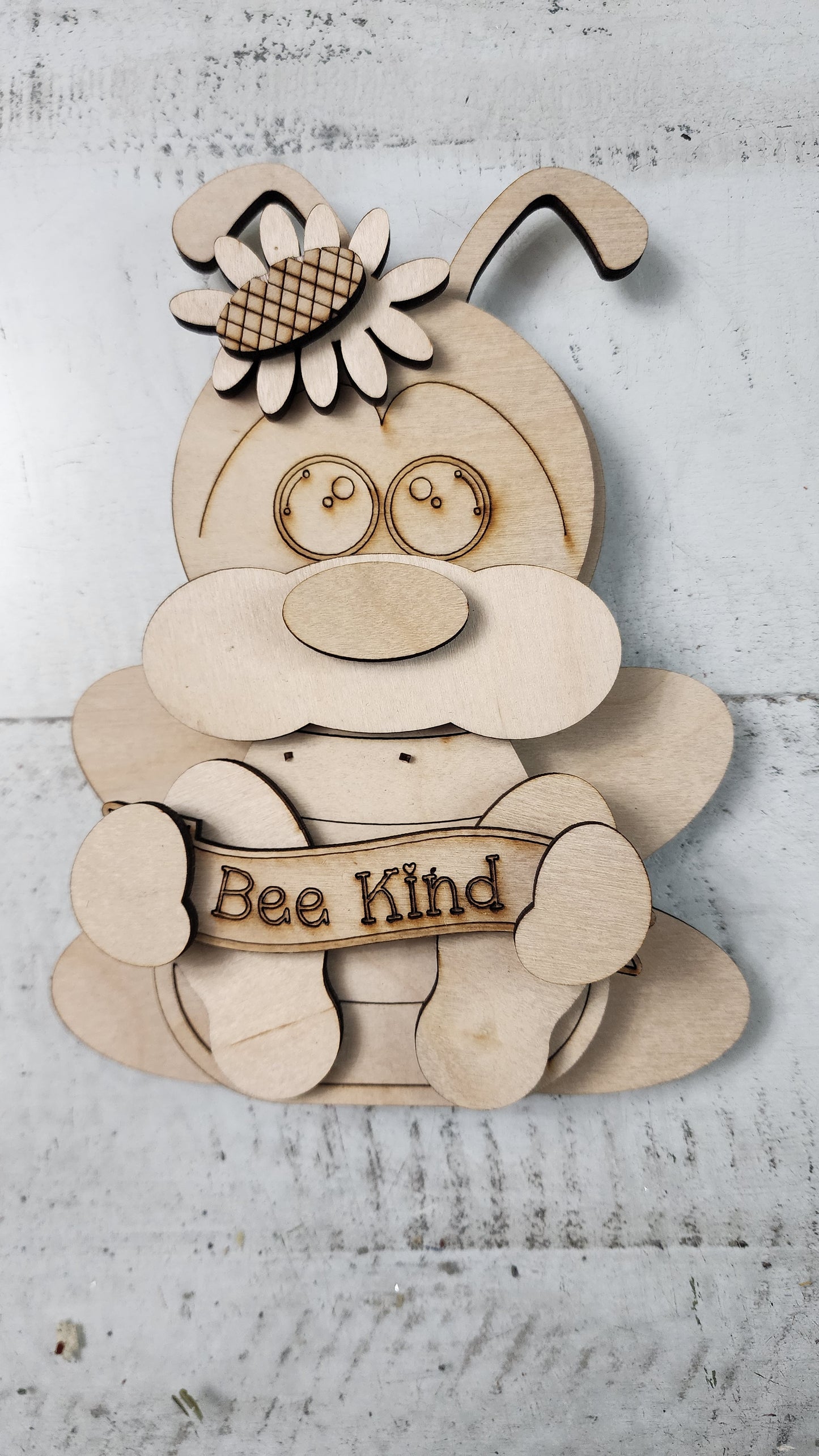 Bee Kind sitting Bee