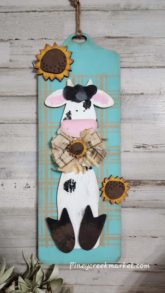 Cow with primitive style board